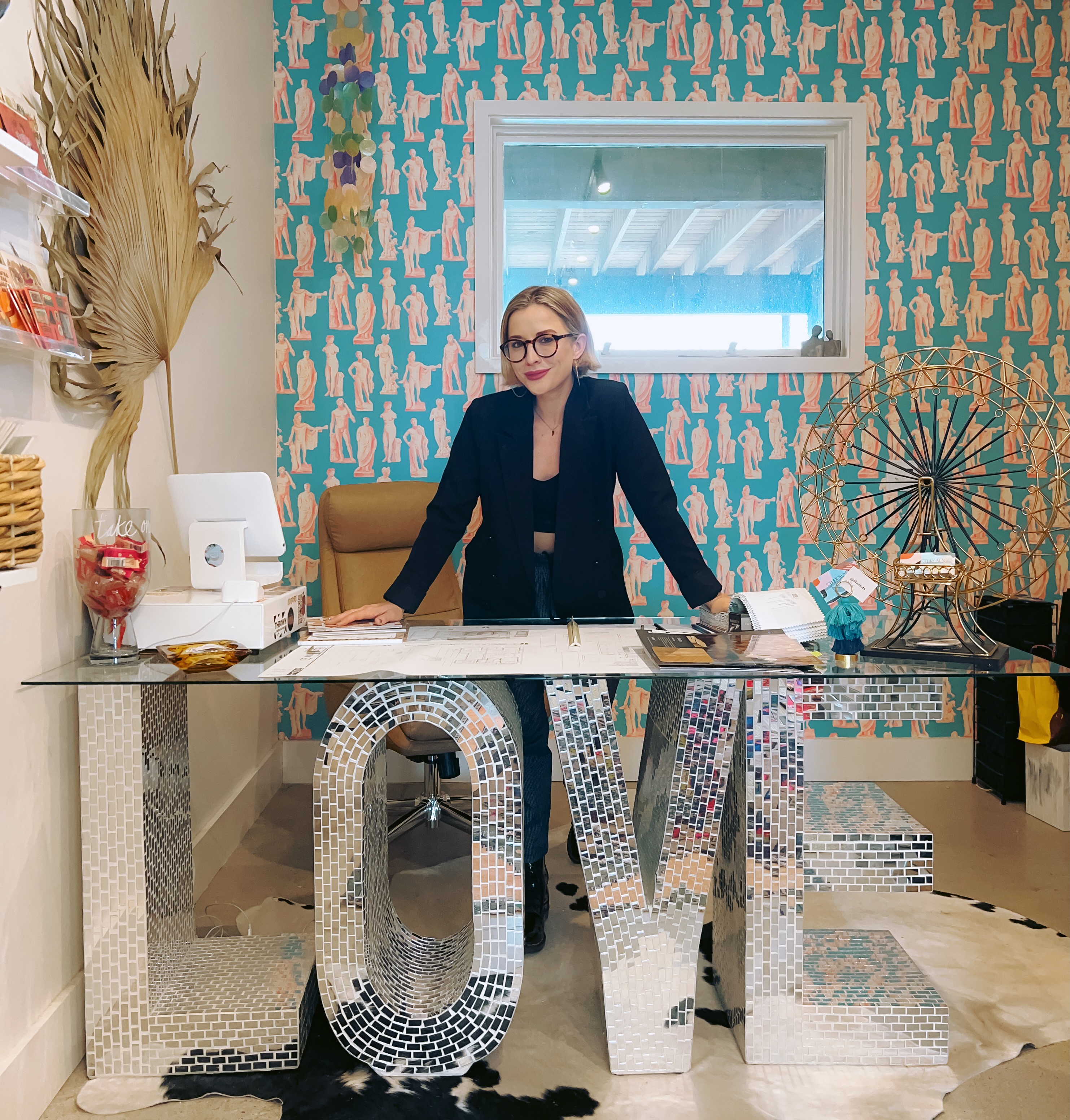 Amber at her desk inside the THROWN office